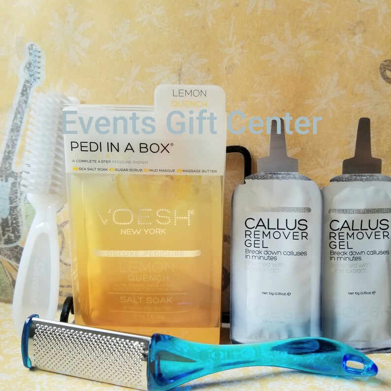 May include: A lemon-scented foot care kit called "Pedi in a Box" by Voesh New York. The kit includes a sea salt soak, sugar scrub, mud masque, and massage butter. It also includes two tubes of callus remover gel.