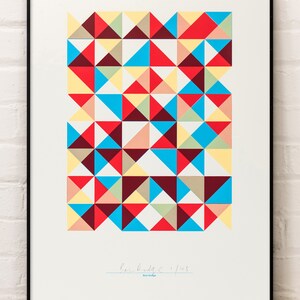 May include: A framed print of a geometric abstract design featuring a pattern of red, yellow, blue, green, and brown triangles. The print is signed "Ben Doodle 1/45" and "Ben Doodle" in blue ink.