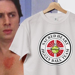 Scrubs Inspired &quot;Sacred Heart Jiggly Ball Team&quot; Graphic Tee - Relive the Hilarious Jiggle Ball Episode!