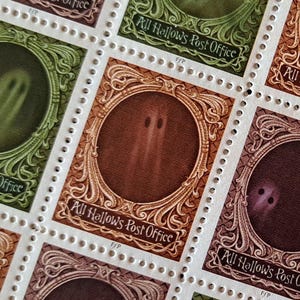 May include: A sheet of postage stamps with a spooky theme. Each stamp features a ghostly figure in a circular frame, with the text "All Hallows Post Office" around the image. The stamps are in shades of green, brown, and purple, with a vintage design.