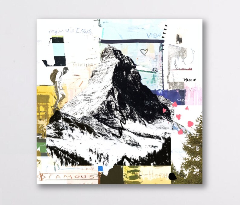 May include: Abstract art print featuring a black and white mountain illustration with the words "FAMOUS" and "FOLLOW YOUR HEART". The artwork includes a hiker, a heart, and the word "VIEW". The background has a collage of colors.