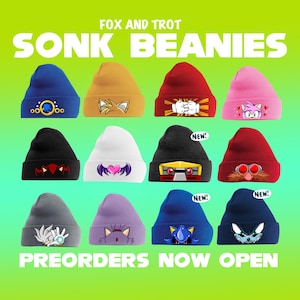 May include: A selection of beanies in various colours, each featuring a character design. The beanies are in shades of blue, yellow, red, and pink. The text "SONK BEANIES" and "PREORDERS NOW OPEN" are displayed on a green background.