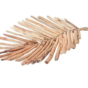 May include: A decorative leaf made of driftwood. The leaf is light brown and has a natural, rustic look.