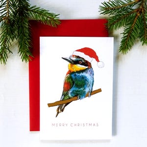 Cartão de Natal Bee Eater, Pássaro colorido com chapéu de Papai Noel, Celebração sazonal, Cartão de felicitações artístico, Ideia de presente inspirada na natureza, Design de luxo