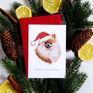 Pomeranian Christmas Card, Puszysty szczeniak w czapce Mikołaja, Wesoła kartka świąteczna dla psa, Radosne święta, Prezent dla miłośnika szpiców, Pomysł na prezent dla mamy Pommy