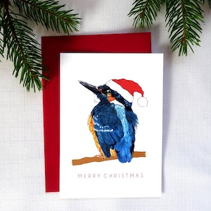 Martin-pêcheur en carte de Noël bonnet de Noel, carte de voeux joyeux Noël oiseau pêcheur, oiseau chanteur illustré à la main