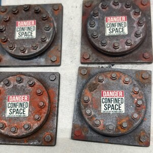 1:12 scale Detailed Confined space replica access flanges.  Rusted tank hatches