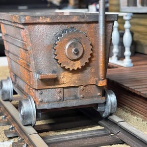1:12 scale mine cart miner&#39;s with rail.  Rusted free rolling mining cart toy photography