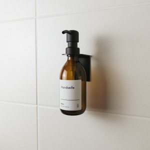 customizable soap dispenser made of 100% recyclable amber glass