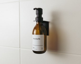 customizable soap dispenser made of 100% recyclable amber glass