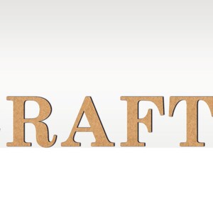 May include: The word "CRAFTS" spelled out in large, brown, wooden letters.