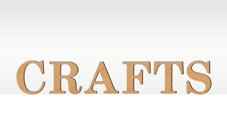 May include: The word "CRAFTS" spelled out in large, brown, wooden letters.