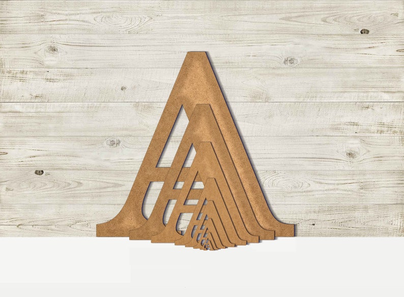 May include: A set of wooden triangle shapes in various sizes, stacked on top of each other, creating a geometric pattern. The shapes are a light brown color and have a smooth, polished finish.