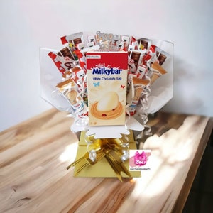 Påskchokladbukett: Smarties & Cadbury påskkorg