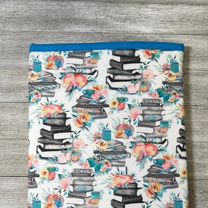 Floral Book Stacks Book Sleeve: Padded E-reader Cover