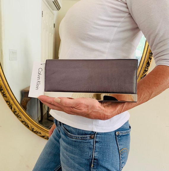 Calvin klein clutch sale