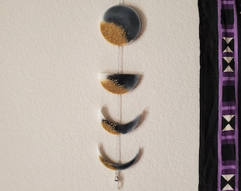 Decoração de parede com fases da lua