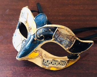 Carnival Mask. Gold and Black with with Music Motif and Images of Venice.