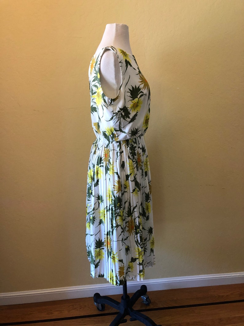 Sleeveless Bold Yellow Size 6-8 1960s Spring Flowers Dress Gold and Green Floral Design on White Background Fun!