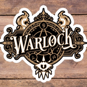 May include: A black and gold sticker with the word "Warlock" in a stylized font. The sticker features a circular design with flames on either side and a symbol in the center.