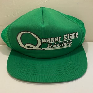 May include: Green trucker hat with a white "Quaker State Racing" logo. The hat has a mesh back.