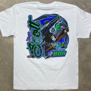 May include: White t-shirt with a green, blue, and black graphic of a race car with the text "Robbie Scott" and "BDR Brian Daniels Racing" on the back.
