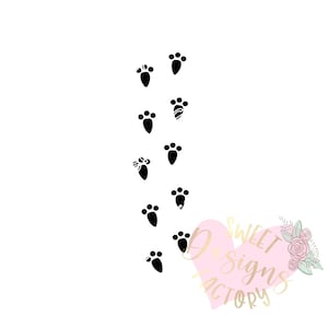 May include: Black paw prints in a vertical line on a white background. The paw prints are of varying sizes and are arranged in a random order. The text "Sweet Designs Factory" is in a pink heart shape at the bottom right of the image.