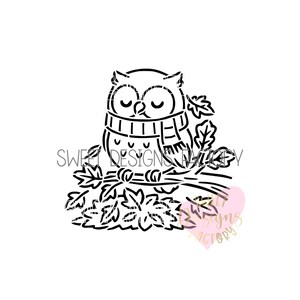 May include: A black and white stencil design featuring a cartoon owl with closed eyes wearing a striped scarf, perched on a branch surrounded by autumn leaves. The text SWEET DESIGNS FACTORY is visible across the centre of the illustration.