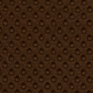 May include: Brown fabric with a textured pattern of small, raised circles.