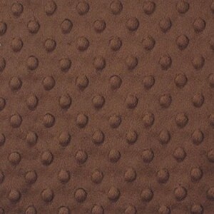 May include: A close-up of a brown minky fabric with a textured dot pattern.