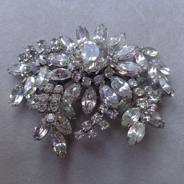 Sherman tiered stylized floral brooch with clear crystals