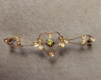 Sentimental 14K gold heart brooch with peridot and seed pearls