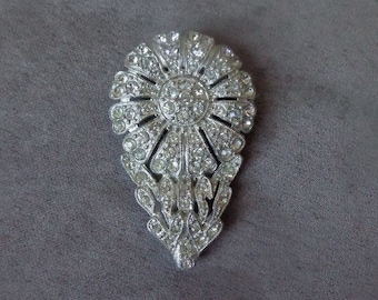 Pot metal Cornflower dress clip pave set with clear rhinestones