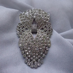 Rhodium plated dress clip with clear crystals
