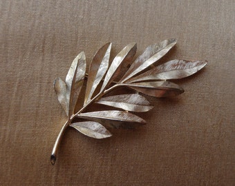 Broche feuille dorée TRIFARI