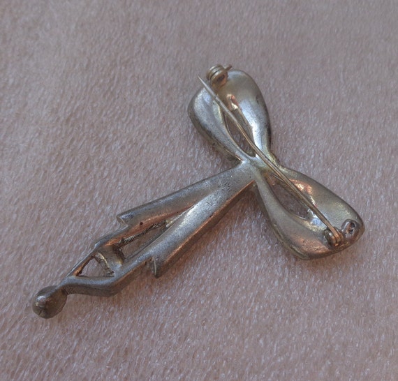 Pot metal bow brooch with blue and clear rhinesto… - image 3