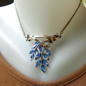 TRIFARI silver tone floral necklace with blue and clear crystals