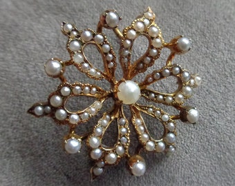 14 Kt. gold brooch with natural seed pearls