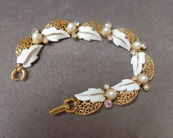 Enameled gold tone bracelet with faux pearls and AB rhinestones