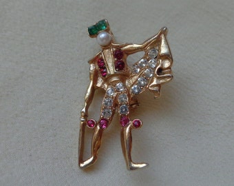 Tiny matador brooch with faux pearl and glass stones