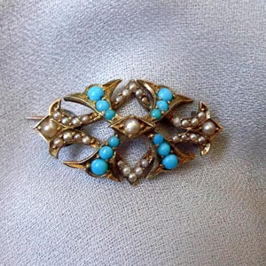 Victorian gold brooch with seed pearls and turquoise cabochons