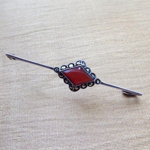 Sterling silver bar brooch with carnelian and marcasite.