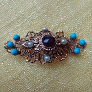 Ornate filigree bar brooch with garnet paste, faux turquoise and faux pearls