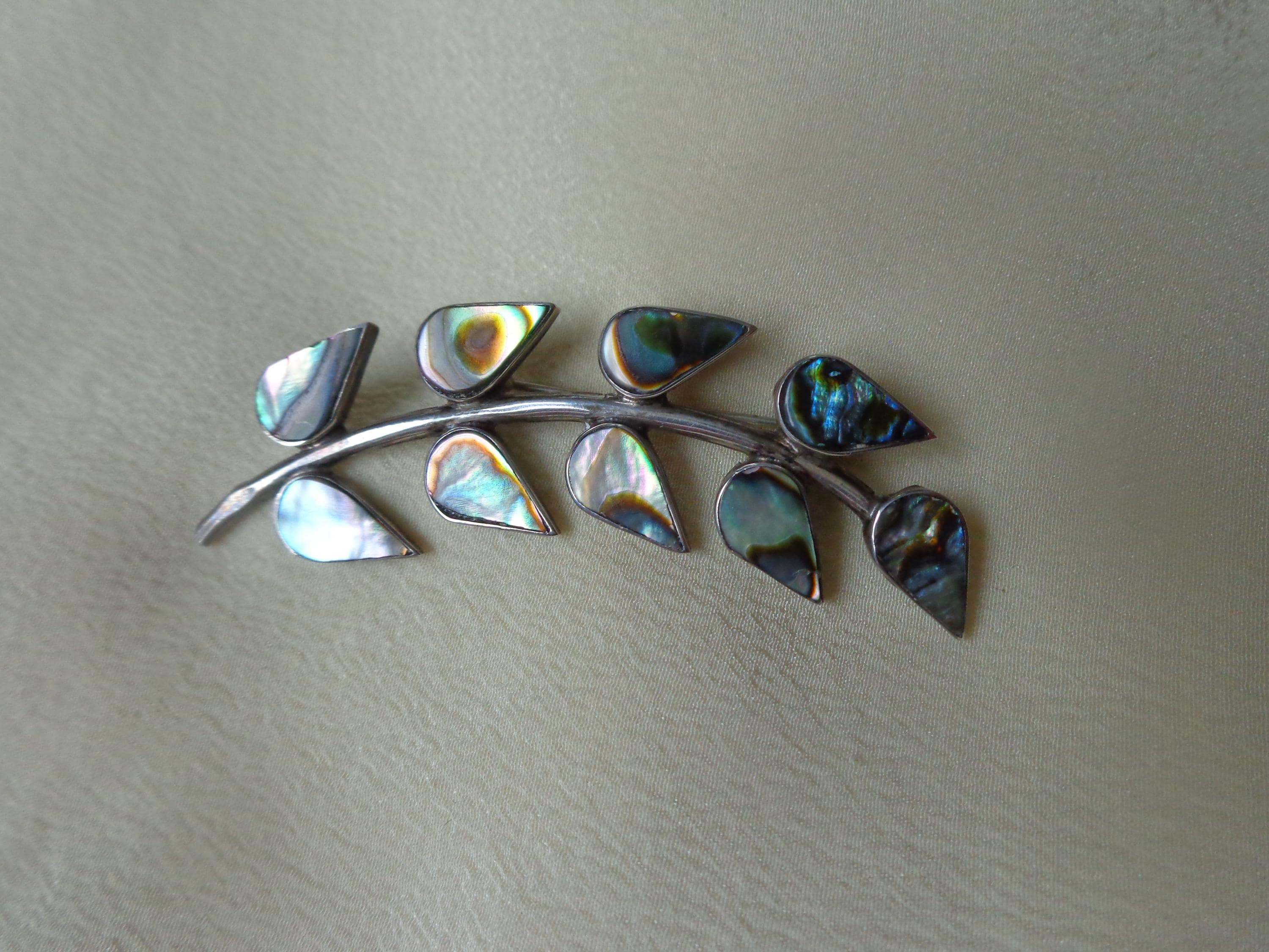 Mexican sterling silver brooch with abalone inserts