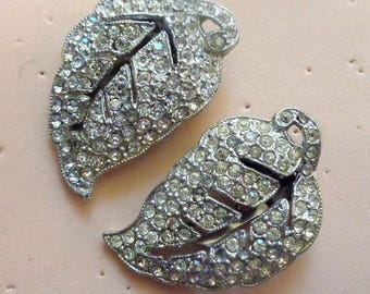 Pair of pot metal leaf design dress clips pave set with clear rhinestones