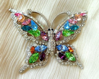 Silver tone butterfly brooch with rhinestones