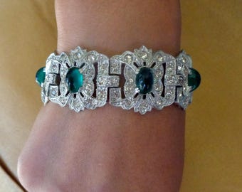 Art Deco bracelet with chrysoprase colored, glass cabochons, and clear, bead set crystals.