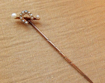 15 karat gold horseshoe stickpin with seed pearls