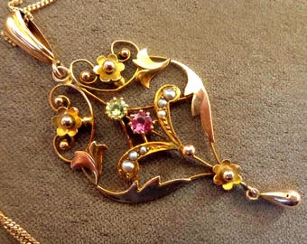Suffragette gold pendant with peridot, amethyst and seed pearls