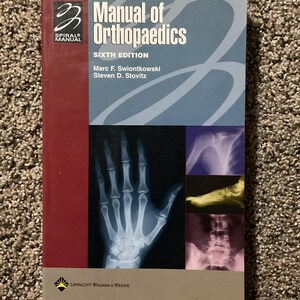 May include: A textbook titled "Manual of Orthopaedics, Sixth Edition" with a red spine and a blue and white cover. The cover features an X-ray of a hand and other medical images. Authors are Marc F. Swiontkowski and Steven D. Stovitz.